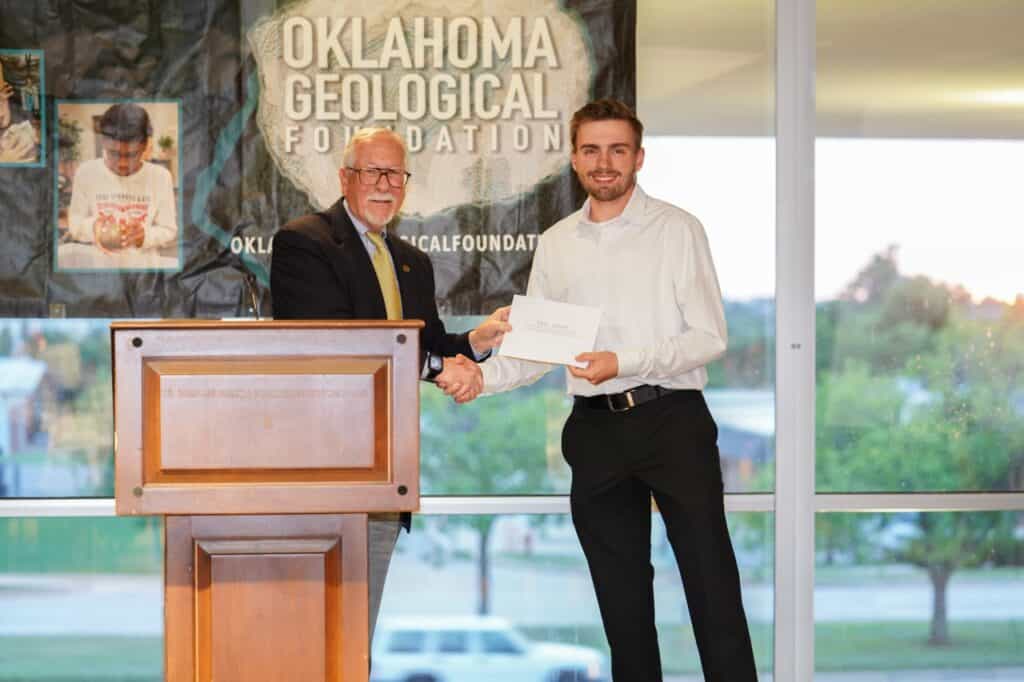 Student receiving an award from the Oklahoma Geological Foundation in recognition of achievement in Earth science education and geoscience studies.
